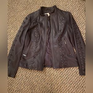 Leather designer coat .